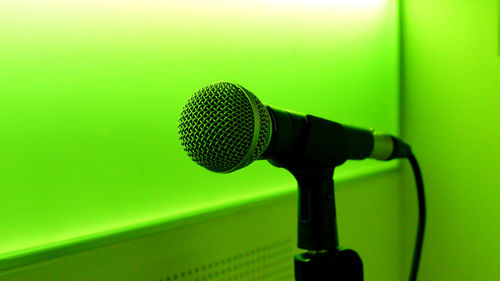 Close-up of microphone in illuminated room