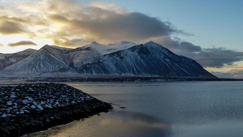 Scenic view of snowcapped mountains against sky