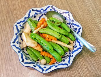 High angle view of salad in plate on table