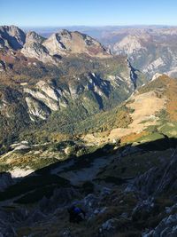 Scenic view of landscape and mountains against sky