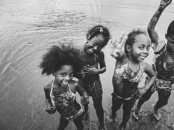 Portrait of a smiling girl in water