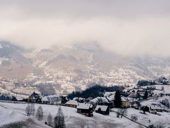 Scenic view of mountains against sky during winter