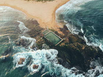 High angle view of rocks by swimming pool