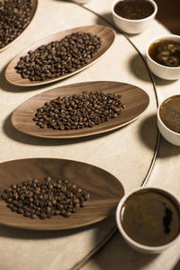 Close-up of coffee beans on table