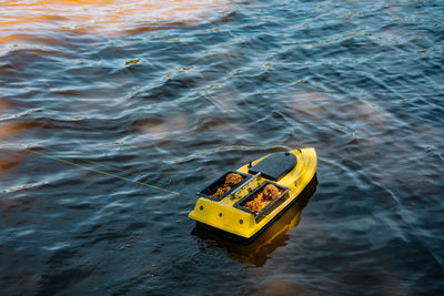 Fishing bait in boat on lake