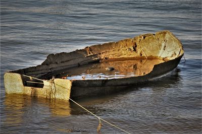 High angle view of abandoned boat on sea