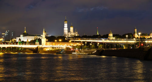 Night view of the moskva river and the city of moscow, tourist attractions. blurry view, bokeh.