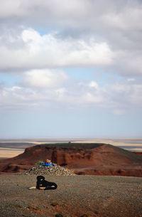 Scenic view of land against sky
