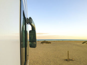 Scenic view of beach against clear sky