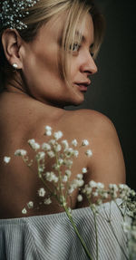 Portrait of young woman looking away