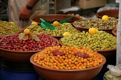 Close-up of various olives for sale in market