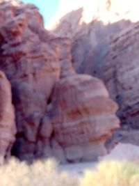 Close-up of rock formation against sky