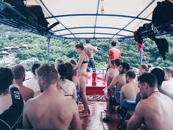 Group of people looking at swimming pool