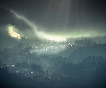 Panoramic view of landscape against sky at night