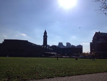 Sun shining through buildings