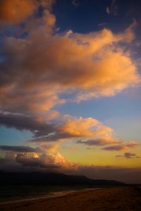 Scenic view of dramatic sky over land