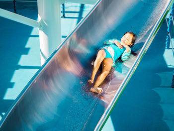 High angle view of man swimming in pool