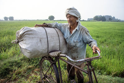 Man riding horse on field