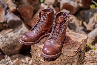 Close-up of shoes on rock