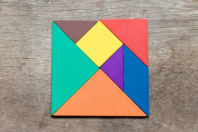 Directly above shot of colorful blocks on wooden table