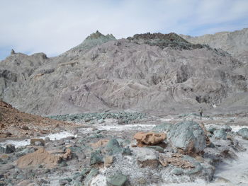 Rocks on land against sky