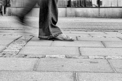 Low section of man on steps