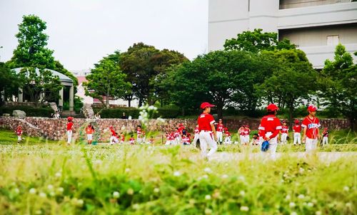 People on field in park