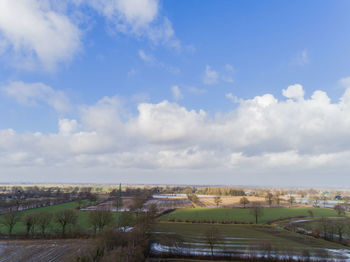 Aerial view of cityscape against sky