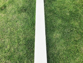 High angle view of white yard line on playing field