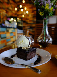 Close-up of cake served on table