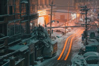 High angle view of illuminated city during winter