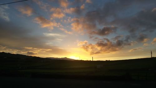 Scenic view of dramatic sky during sunset