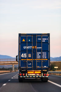 Bus on road against sky