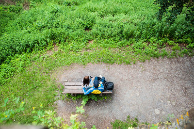 High angle view of women sitting on grass