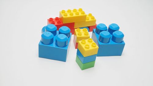 Close-up of toys against white background