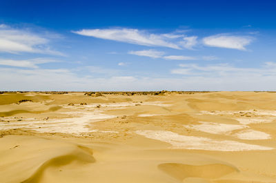 Scenic view of desert against sky