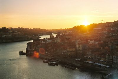 High angle view of city at sunset