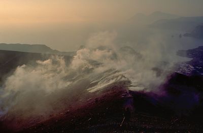 Scenic view of mountains against sky during sunset