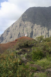 Scenic view of landscape and mountains against sky