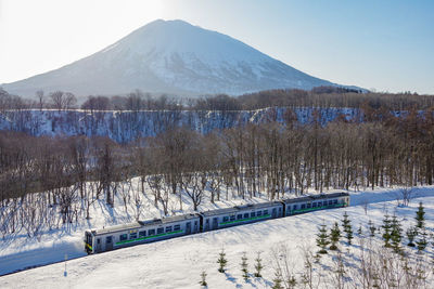 Mt. yotei and local train of three cars formation