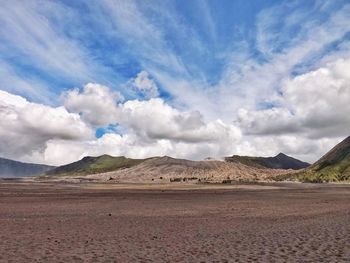 Scenic view of desert against sky