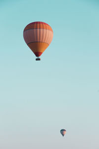 Two air balloons circling drunk
