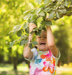 Girl holding twig