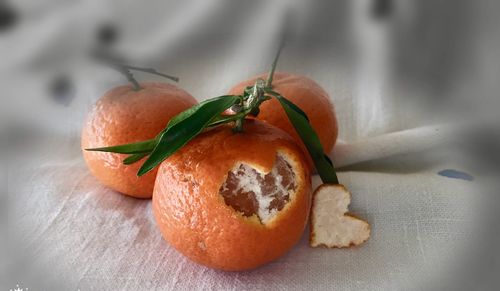 Close-up of orange fruit on table