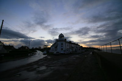 View of road against cloudy sky