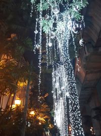 Low angle view of illuminated street light