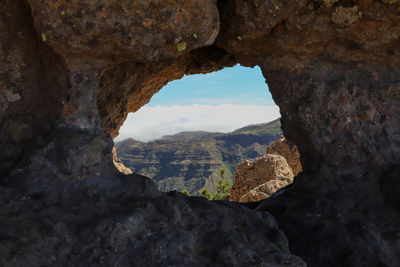 Scenic view of rock formation against sky