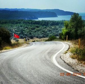 Country road passing through landscape