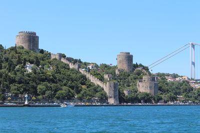 Rumeli castle in istanbul and fatih sultan mehmet bridge on the background