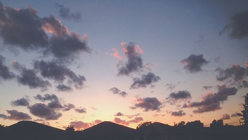 Silhouette mountains against sky during sunset